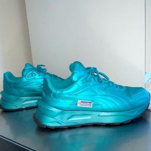 Metallic teal Mercedes Pumas